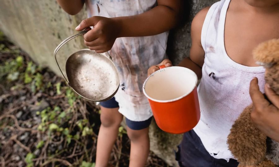 cropped-view-of-homeless-african-american-kids-holding-cup-and-metal-plate-while-begging-alms-on.jpg